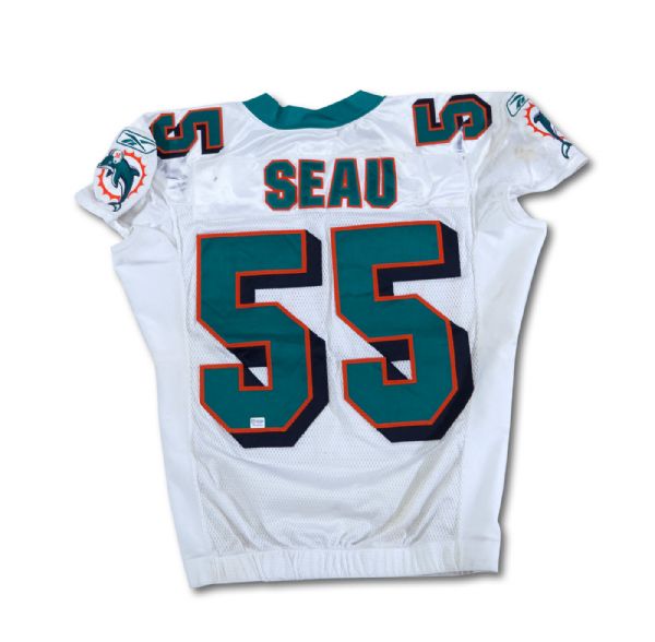 2004 JUNIOR SEAU MIAMI DOLPHINS GAME WORN ROAD JERSEY WITH INCREDIBLE WEAR! (NFL COA)