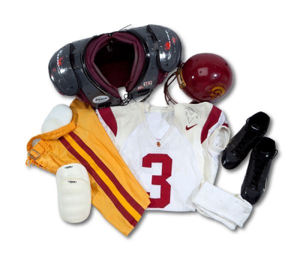 C. 2000-02 CARSON PALMER USC TROJANS GAME WORN ENSEMBLE INCL. JERSEY (SIGNED), PANTS, HELMET (SIGNED), CLEATS AND PADS (JERSEY-USC LOA, NSM COLLECTION)