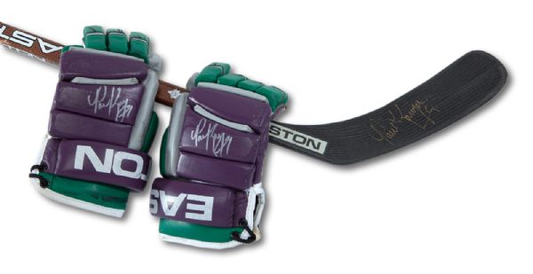 EARLY 2000S PAUL KARIYA ANAHEIM MIGHTY DUCKS SIGNED PAIR OF GAME WORN EASTON GLOVES AND SIGNED GAME USED EASTON STICK (NSM COLLECTION)