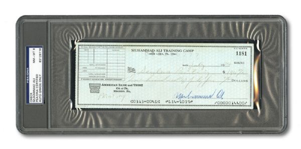 1974 MUHAMMAD ALI SIGNED TRAINING CAMP BANK CHECK 