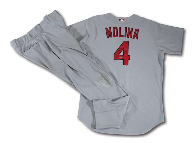 2010 YADIER MOLINA AUTOGRAPHED ST. LOUIS CARDINALS GAME WORN ROAD JERSEY & PANTS W/ MULTIPLE TEAM REPAIRS (MLB AUTH.)