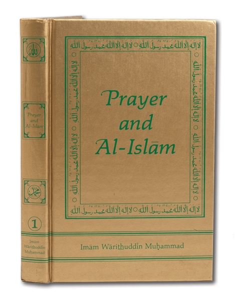 MUHAMMAD ALI SIGNED 1982 COPY OF "PRAYER AND AL-ISLAM"