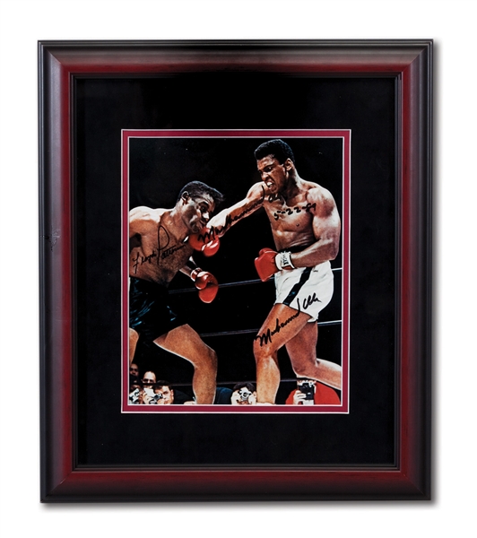 MUHAMMAD ALI AND FLOYD PATTERSON DUAL SIGNED PHOTO FROM THEIR NOV. 22, 1965 FIGHT - ALI SIGNED TWICE
