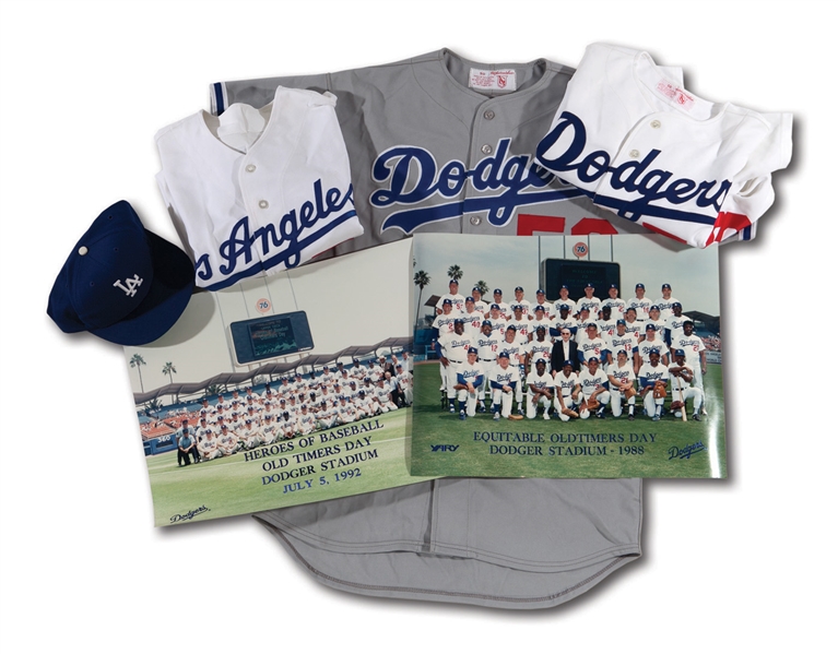 DON DRYSDALES MID 1980S - EARLY 1990S DODGERS OLD TIMERS GROUP OF (3) GAME WORN JERSEYS, (1) GAME WORN CAP AND (2) TEAM PHOTOS (DRYSDALE COLLECTION)