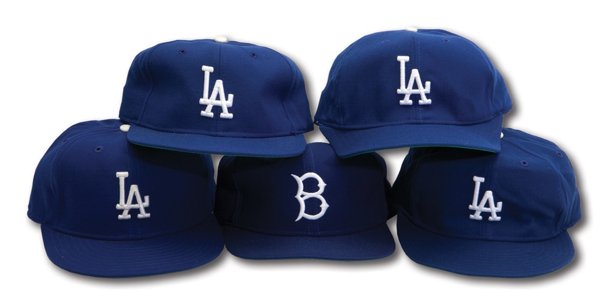 DON DRYSDALES MID-LATE 1980S GROUP OF (4) L.A. DODGERS PRO MODEL CAPS AND (1) BROOKLYN THROWBACK CAP (DRYSDALE COLLECTION)