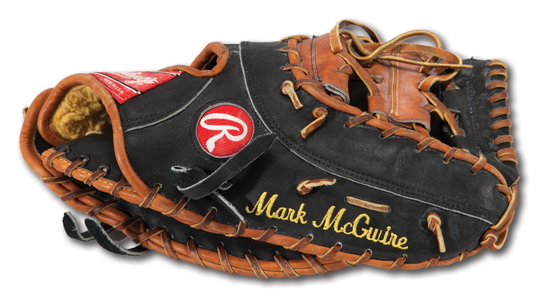 C.1996-2001 MARK MCGWIRE GAME USED RAWLINGS PROFESSIONAL MODEL GAME USED FIRST BASEMANS GLOVE (DELBERT MICKEL COLLECTION)