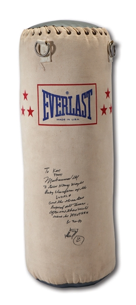 MUHAMMAD ALI AUTOGRAPHED AND WONDERFULLY INSCRIBED EVERLAST HEAVY BAG WITH RING SKETCH (INCL. PHOTOS OF ALI SIGNING)