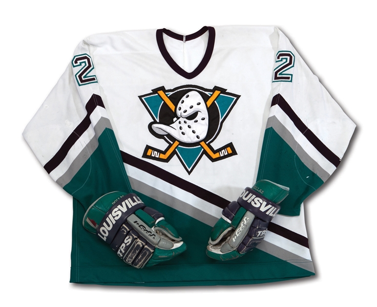 1993-94 BOBBY DOLLAS ANAHEIM MIGHTY DUCKS INAUGURAL SEASON GAME WORN HOME JERSEY AND TPS PAIR OF GAME WORN GLOVES (NSM COLLECTION)