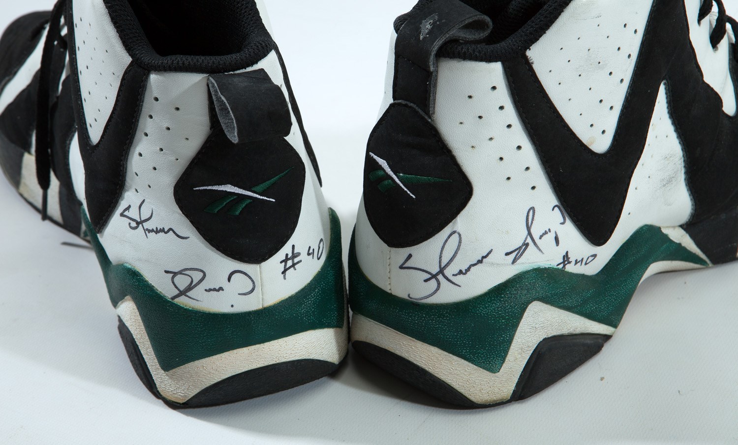 Lot Detail - 1995-96 SHAWN KEMP GAME WORN & SIGNED REEBOK 'KAMIKAZE II' AND  'OPTIX' SHOES (2 PAIRS) FROM SONICS 64-18 NBA FINALS SEASON (COBY KARL  COLLECTION)