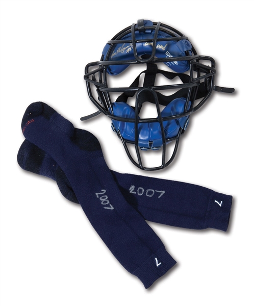 2007 IVAN RODRIGUEZ DETROIT TIGERS GAME USED & SIGNED CATCHERS MASK AND PAIR OF SOCKS (RODRIGUEZ LOA)