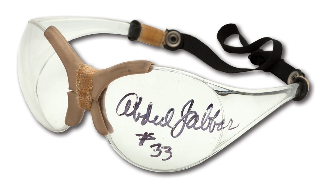1980S KAREEM ABDUL-JABBAR AUTOGRAPHED PAIR OF GAME WORN GOGGLES (HOLLYWOOD AGENT COLLECTION)