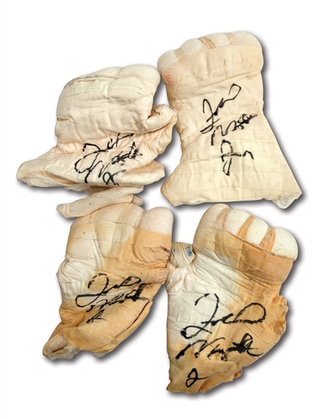 TWO PAIRS OF FLOYD MAYWEATHER JR. DUAL-SIGNED FIGHT WORN WRAPS (HOLLYWOOD AGENT COLLECTION)