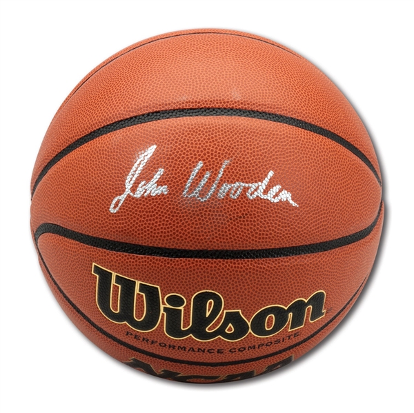 JOHN WOODEN SINGLE SIGNED WILSON OFFICIAL NCAA GAME BASKETBALL