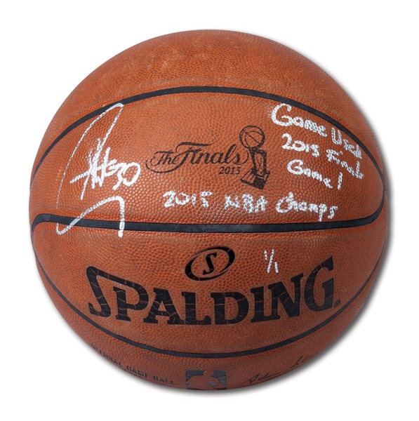 JUNE 1, 2015 NBA FINALS (WARRIORS VS. CAVS) GAME 1 USED BASKETBALL (1/1) SIGNED BY STEPHEN CURRY WITH "2015 NBA CHAMPS" INSCRIPTION (FANATICS)