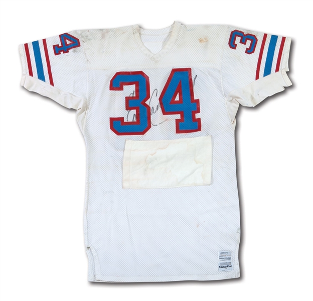 C.1981-84 EARL CAMPBELL SIGNED & INSCRIBED HOUSTON OILERS GAME WORN ROAD JERSEY WITH CUSTOM HAND POCKET AND INCREDIBLE WEAR - THE FINEST KNOWN EXAMPLE (MEARS A10)