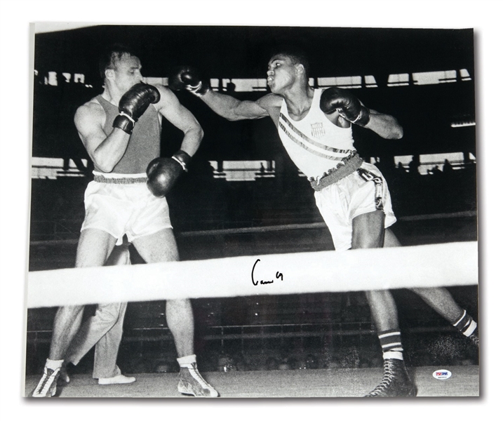 CASSIUS CLAY (MUHAMMAD ALI) SIGNED (20"X 24") PHOTO OF 1960 ROME OLYMPICS BOUT