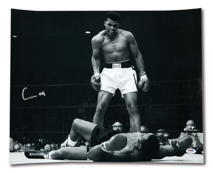 MUHAMMAD ALI SIGNED "CASSIUS CLAY" 16 X 20 PHOTO "STANDING OVER LISTON"