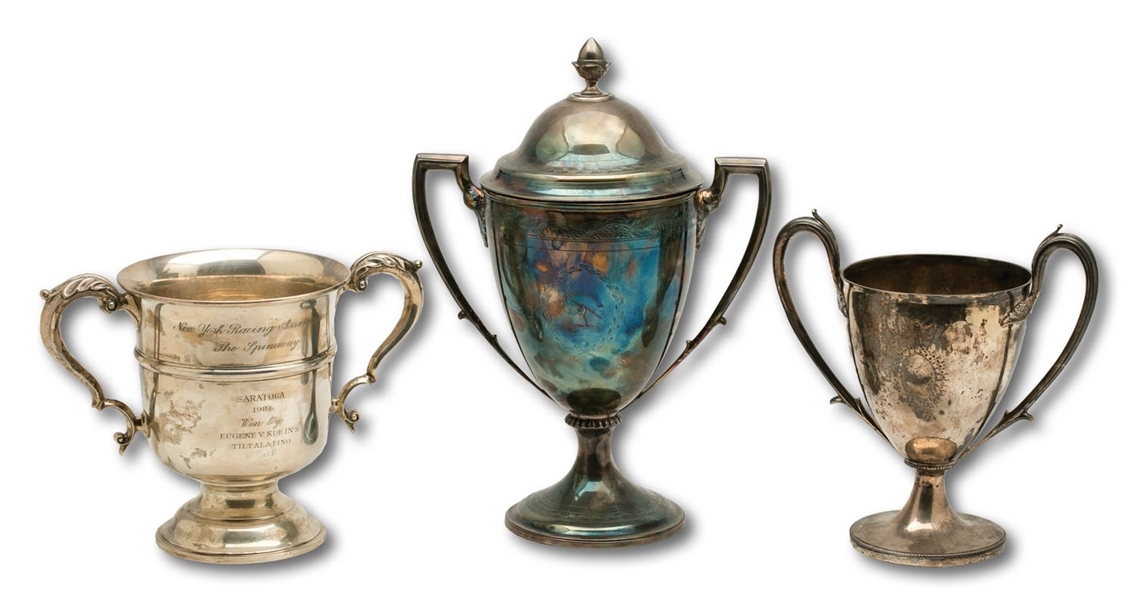 TRIO OF 1984, 1985 AND 1987 SARATOGA RACETRACK (N.Y.R.A.) SPINAWAY STAKES CHAMPION TROPHIES WON BY TILTALATING, FAMILY STYLE AND OVER ALL - ONE STERLING SILVER (SDHOC COLLECTION)