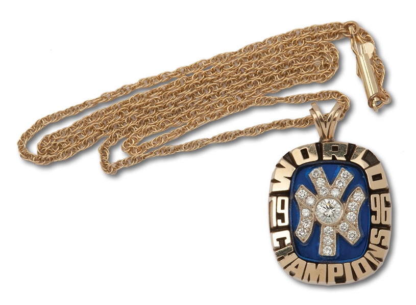 1996 NEW YORK YANKEES WORLD CHAMPIONS 14K GOLD PENDANT (WITH CHAIN) PRESENTED BY GEORGE STEINBRENNER TO HIS DAUGHTER-IN-LAW
