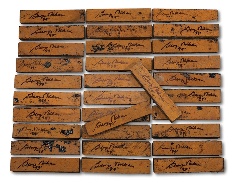 LOT OF (32) GEORGE MIKAN AUTOGRAPHED 11.5" X 2.5" FLOOR PIECES FROM ORIGINAL MINNEAPOLIS ARMORY COURT WHERE LAKERS PLAYED 1947-60 (MIKAN COLLECTION)