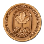 JESSE OWENS CANADIAN OLYMPIC ASSOCIATION MEDAL (OWENS ESTATE COLLECTION)