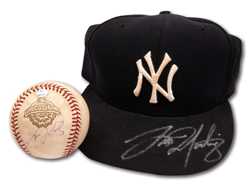 TINO MARTINEZ AUTOGRAPHED LATE 1990S N.Y. YANKEES GAME USED CAP AND 2001 WORLD SERIES GAME 4 USED & SIGNED BASEBALL (MLB AUTH.)