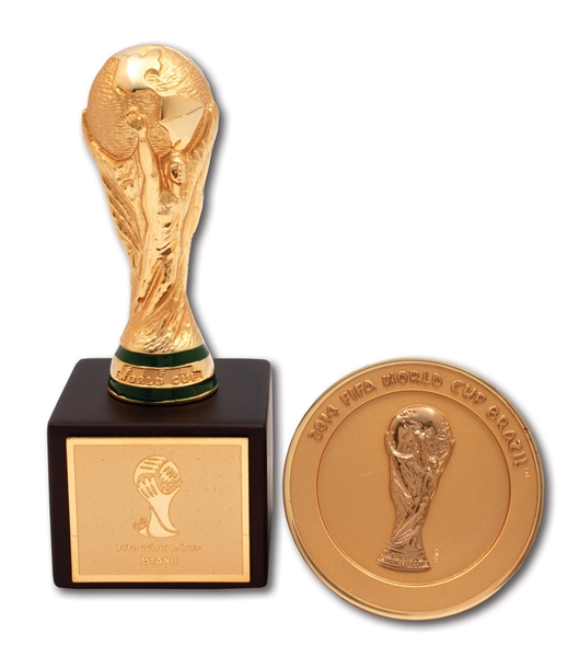 2014 FIFA WORLD CUP (BRAZIL) "PARTICIPANT FINAL COMPETITION" MEDAL AND MINI TROPHY GIVEN TO BRAZIL NATIONAL TEAM STAFF MEMBERS