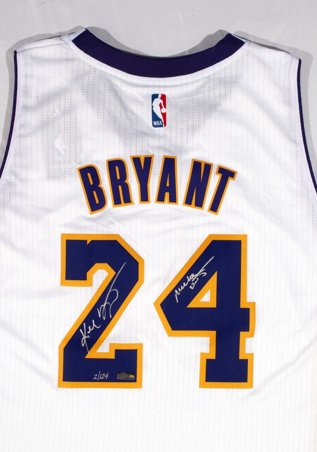 Lot Detail - KOBE BRYANT SIGNED LAKERS SUNDAY WHITE #24 JERSEY INSCRIBED  MAMBA OUT - LE 2/124 (PANINI AUTH.)