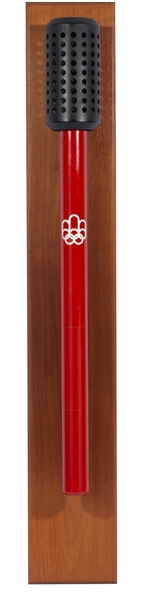 1976 MONTREAL SUMMER OLYMPICS TORCH (UNUSED) WITH WOODEN WALL MOUNT