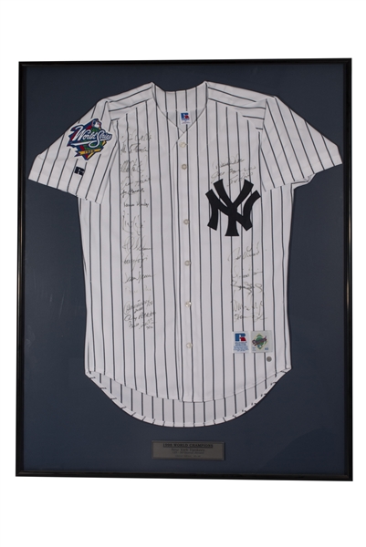 1998 NEW YORK YANKEES WORLD SERIES CHAMPIONS TEAM SIGNED JERSEY IN PROFESSIONAL FRAME - BECKETT