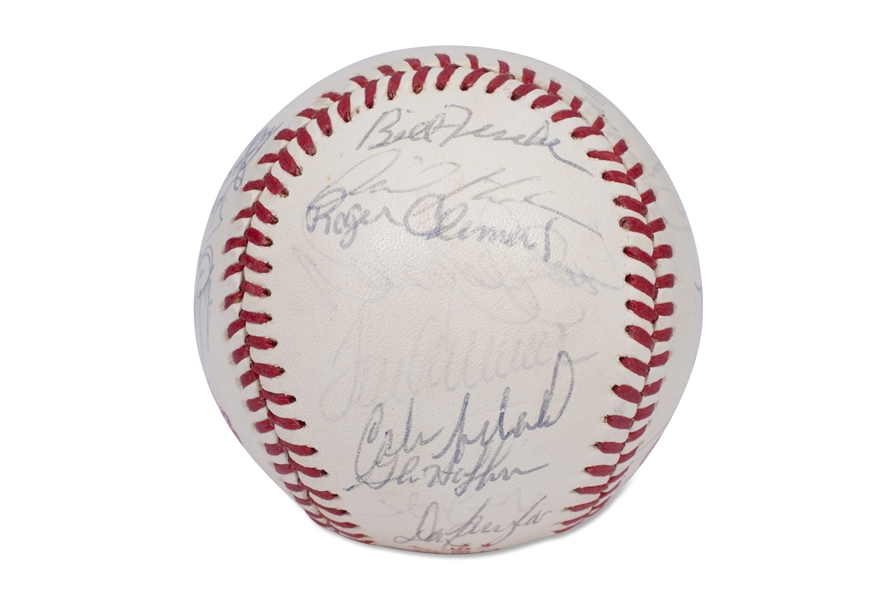 1986 BOSTON RED SOX A.L. CHAMPION TEAM SIGNED OFFICIAL WORLD SERIES (UEBEROTH) BASEBALL INCL. BOGGS, CLEMENS, SEAVER, ETC. - PSA/DNA LOA