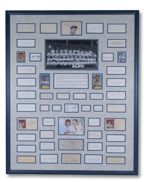 1947 BROOKLYN DODGERS NL CHAMPIONS 32" X 40" FRAMED DISPLAY WITH JACKIE ROBINSON SIGNED CHECK PLUS ARRAY OF DODGERS SIGNED INDEX & BASEBALL CARDS - 48 TOTAL AUTOGRAPHS! - JSA LOA