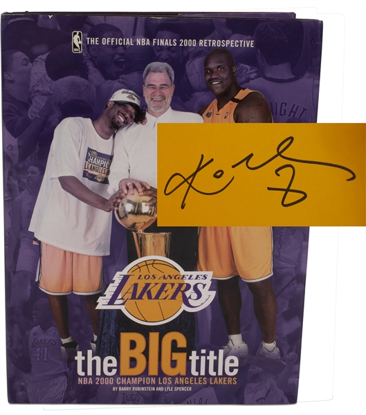 KOBE BRYANT SIGNED COPY OF "THE BIG TITLE NBA 2000 CHAMPION LOS ANGELES LAKERS: THE OFFICIAL NBA FINALS 2000 RESTROSPECTIVE BOOK - PSA/DNA LOA