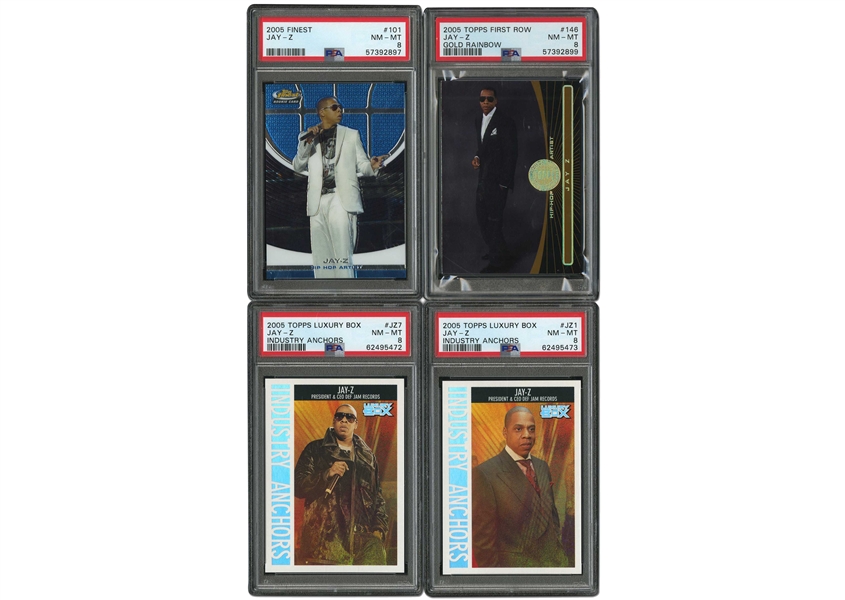 JAY-Z LOT OF (4) 2005 ROOKIES INCL. (2) TOPPS LUXURY BOX INDUSTRY ANCHORS #JZ1 (99/100) & #JZ7 (83/100), TOPPS FIRST ROW #146 GOLD RAINBOW (240/325) AND FINEST #101 (485/599) - ALL PSA NM-MT 8