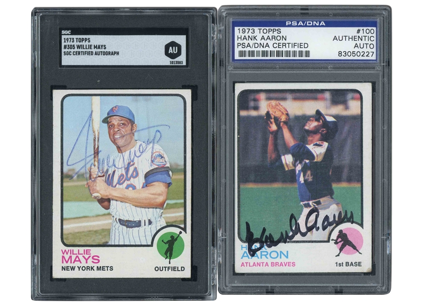 1973 TOPPS PAIR OF #100 HANK AARON AND #305 WILLIE MAYS SIGNED CARDS - PSA/DNA & SGC AUTHENTIC AUTOS.