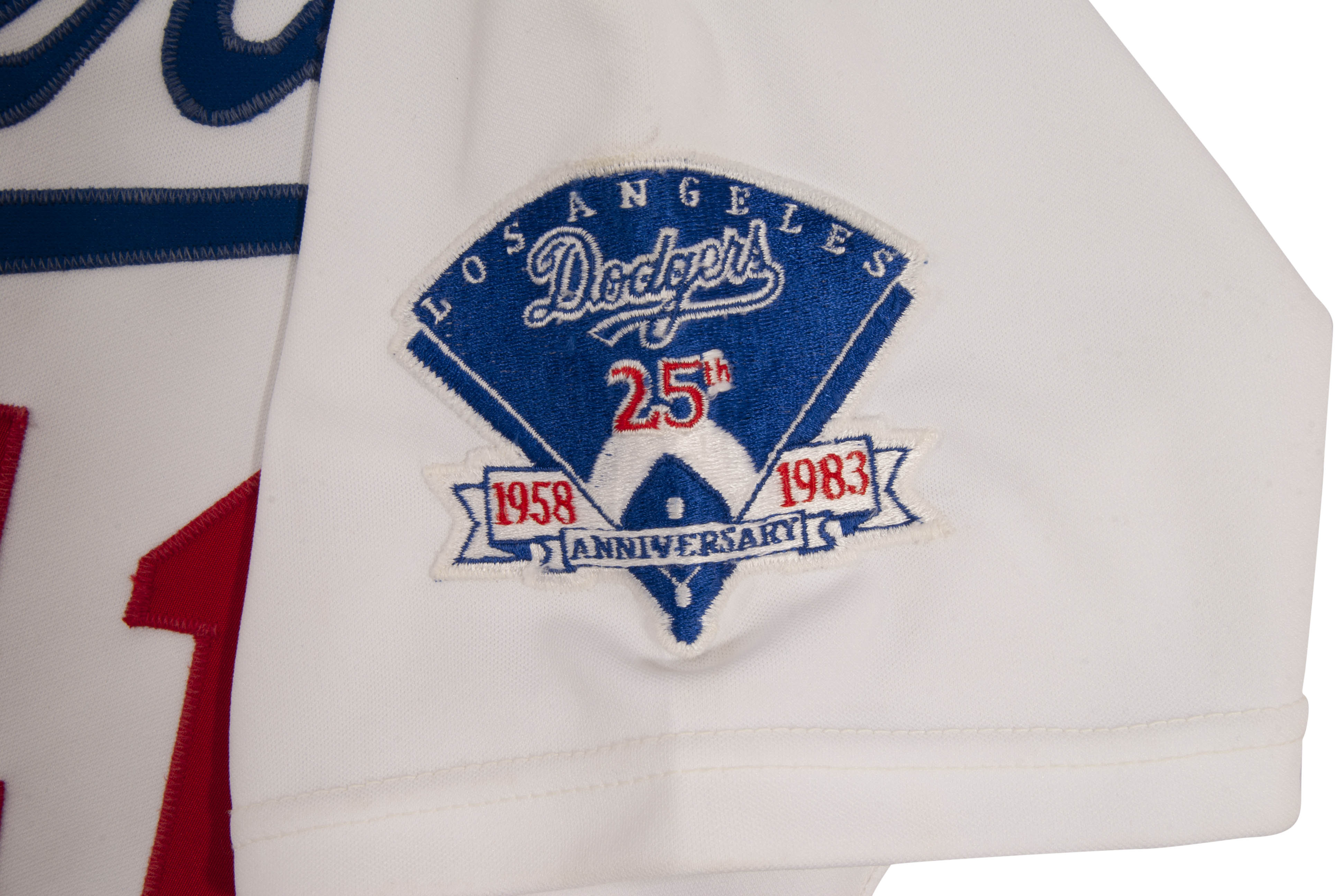 Lot Detail - 1983 JERRY REUSS LOS ANGELES DODGERS GAME WORN HOME JERSEY  WITH '25TH ANNIVERSARY IN L.A.' PATCH (MEARS A10)