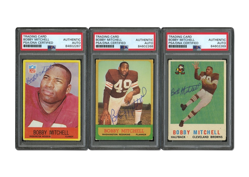 TRIO OF AUTOGRAPHED FOOTBALL CARDS OF HOF & COLOR BARRIER LEGEND BOBBY MITCHELL - 59 TOPPS #140 (ROOKIE), 63 TOPPS #159 & #186 PHILADELPHIA - ALL PSA/DNA AUTH.