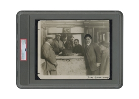 C. 1910 Jack Johnson "Receiving $30K Prize After Beating Jeffries" Original Photograph (w/ Promoters Tex Rickard & John Gleason) – PSA/DNA Type 1