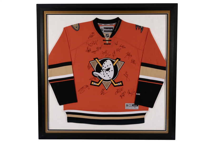 C. 2009-10 Anaheim Ducks Team Signed Orange Jersey – Beckett LOA
